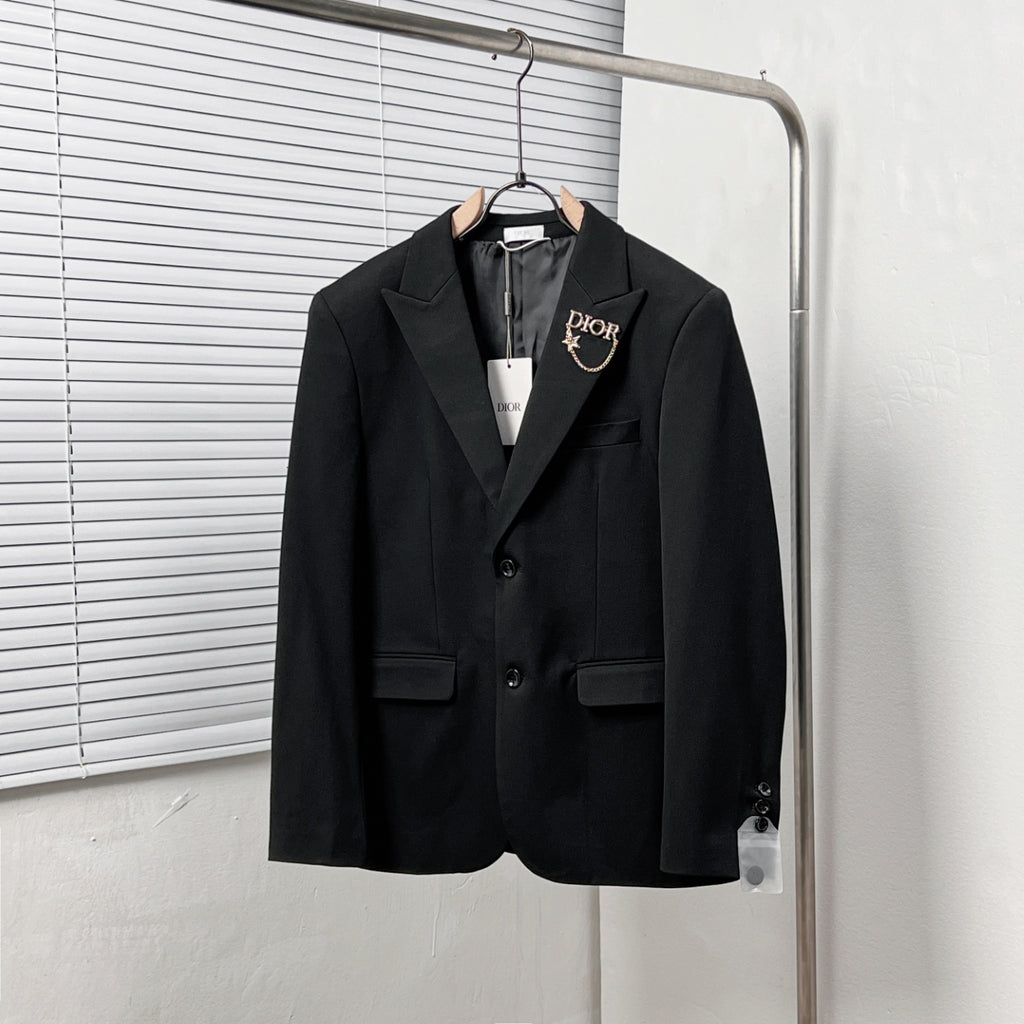 Black Dior suit jacket with notched lapels and two front flap pockets