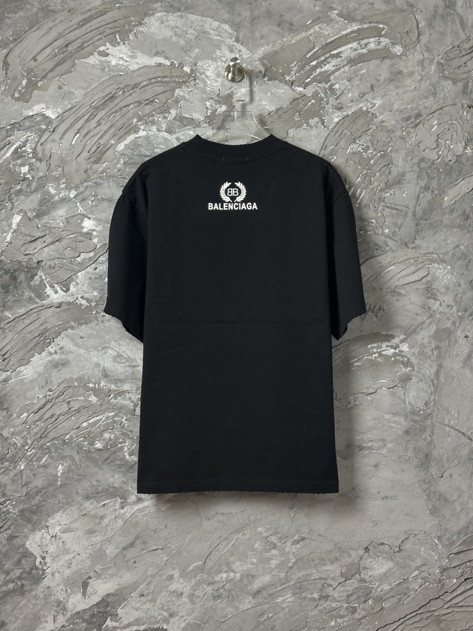 Black short-sleeve T-shirt with BALENCIAGA circular back logo, crew neck