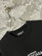 Black short-sleeve T-shirt with crew neck and small BALENCIAGA label