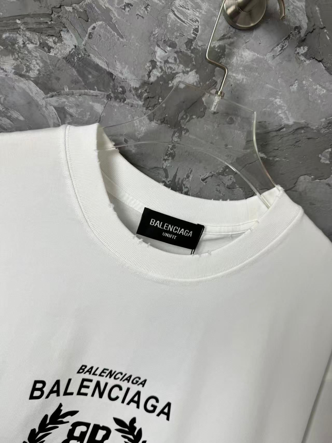 White Balenciaga T-shirt neckline with black brand patch logo