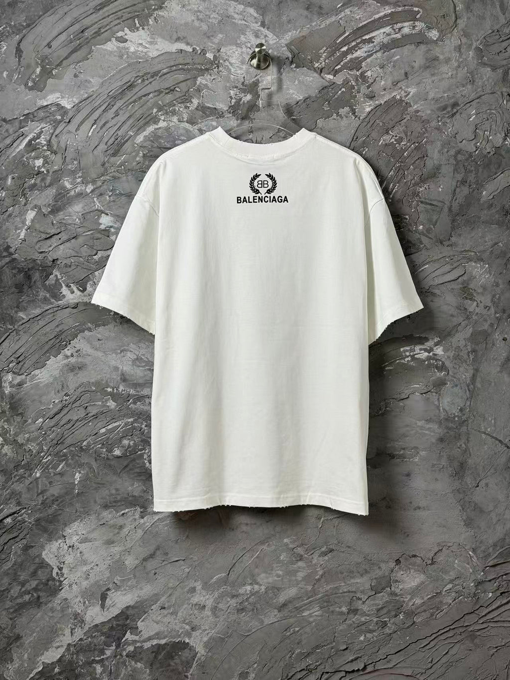 White Balenciaga short-sleeve T-shirt front view with centered logo print