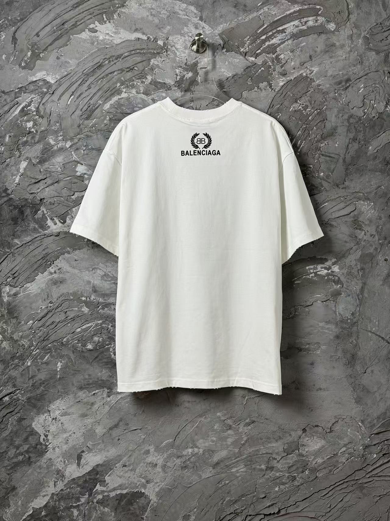 White Balenciaga short-sleeve T-shirt front view with centered logo print