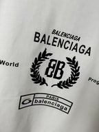 White Balenciaga T-shirt chest graphic with BALENCIAGA text and laurel EB logo