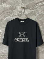 Black short-sleeve T-shirt with large CHANEL chest logo
