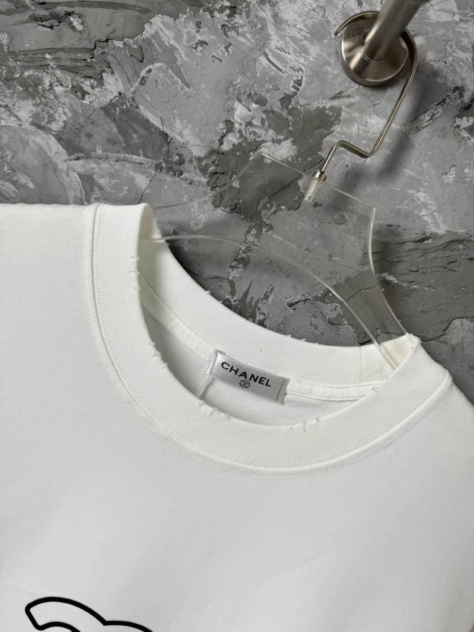 White T-shirt crew neckline with small CHANEL label