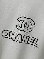 White T-shirt with CHANEL interlocking C and CHANEL text graphic