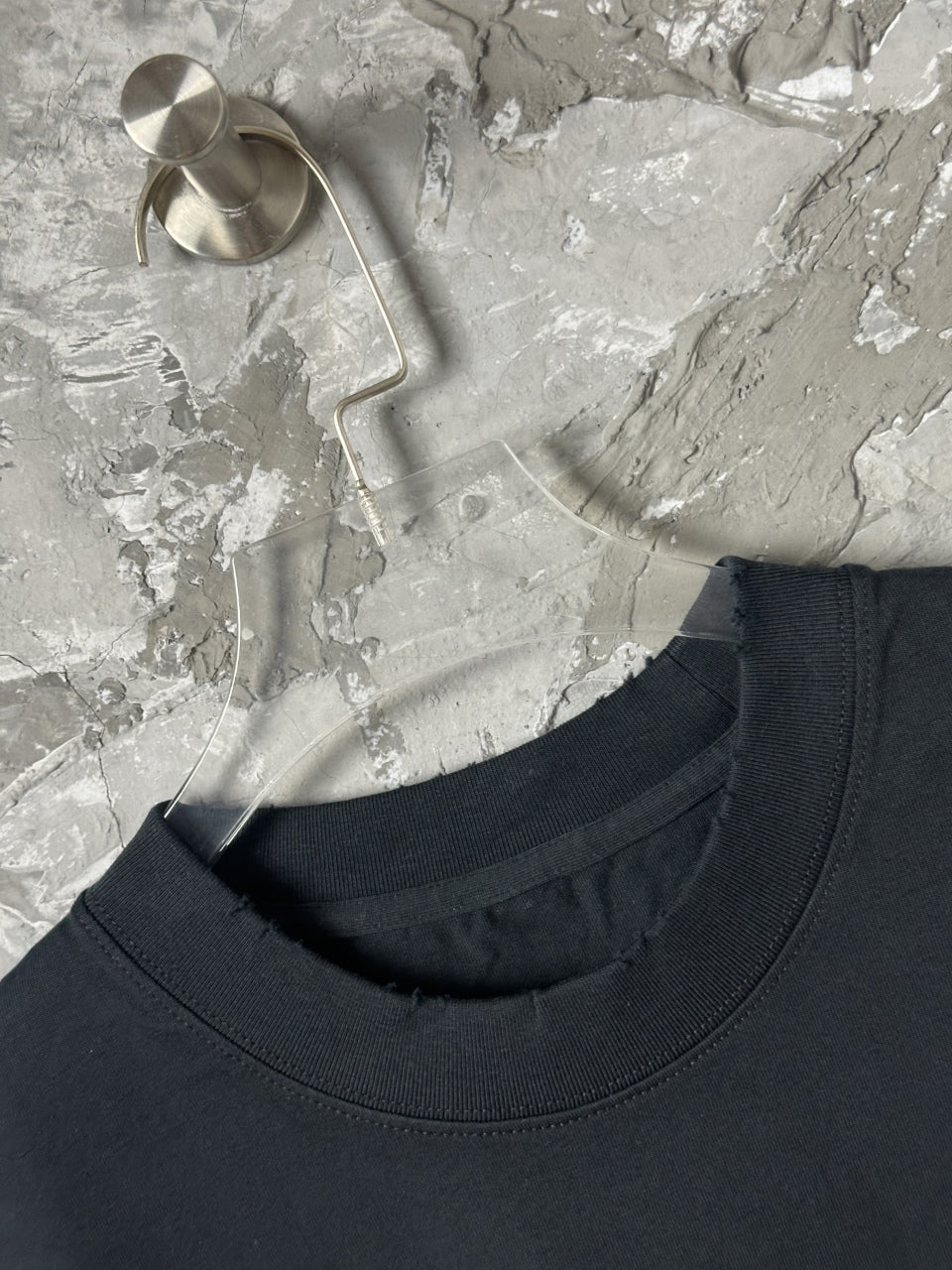 Black short-sleeve T-shirt neckline with ribbed crew collar