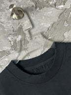 Black short-sleeve T-shirt neckline with ribbed crew collar