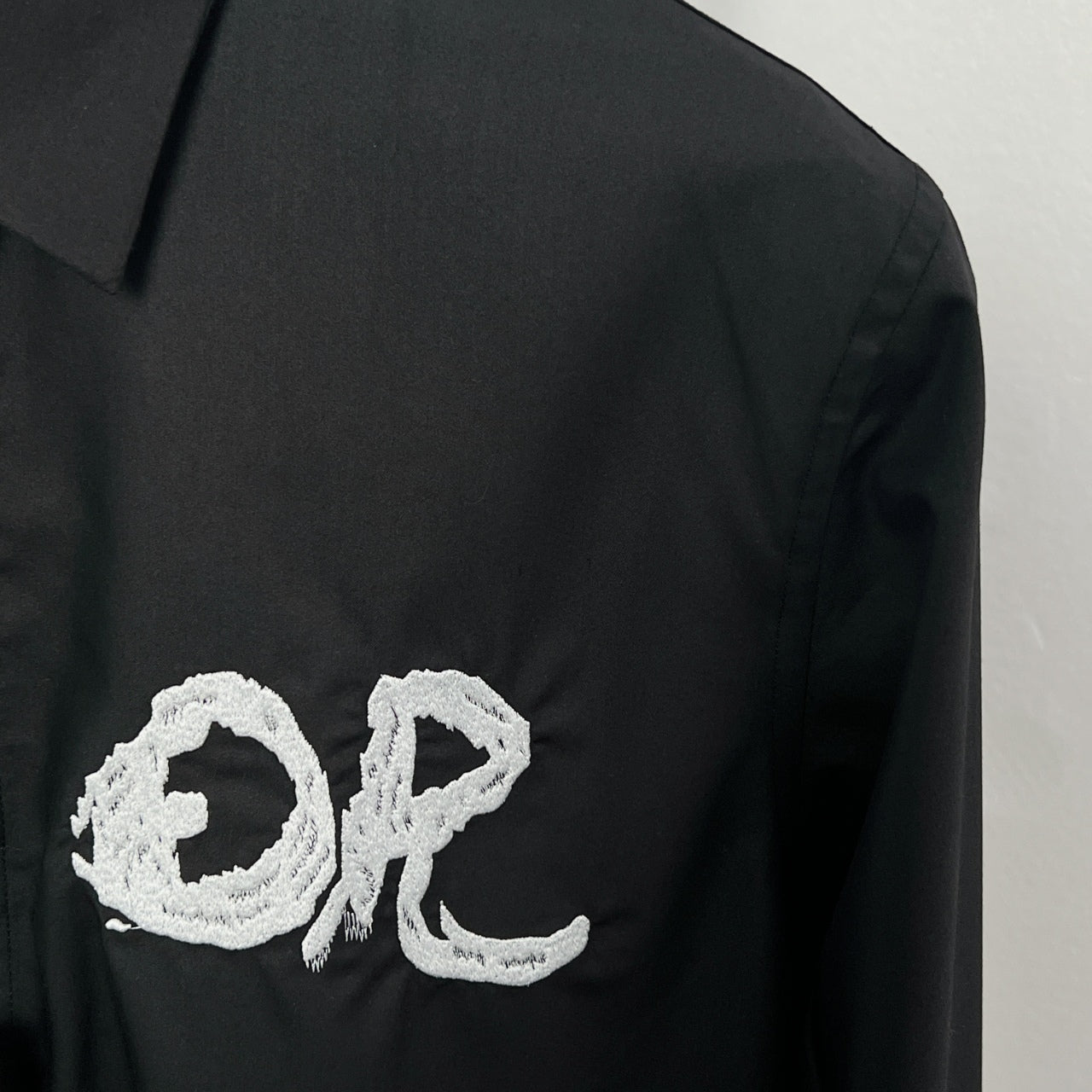 Dior long-sleeve shirt, black with embroidered white logo detail on the chest