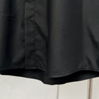 Dior long-sleeve shirt lower front, black with button placket and hem