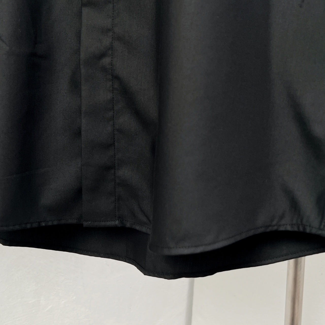 Dior long-sleeve shirt lower front, black with button placket and hem