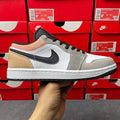 Low-top sneakers, white and gray with black Nike swoosh, lace-up