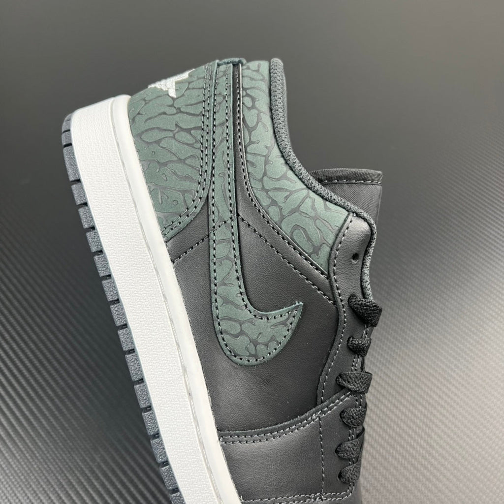 Air Jordan 1 Low quarter panel, grey and teal patterned leather with lace-up