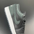 Air Jordan 1 Low quarter panel, grey and teal patterned leather with lace-up