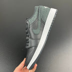 Air Jordan 1 Low side view, grey and teal panels with white midsole