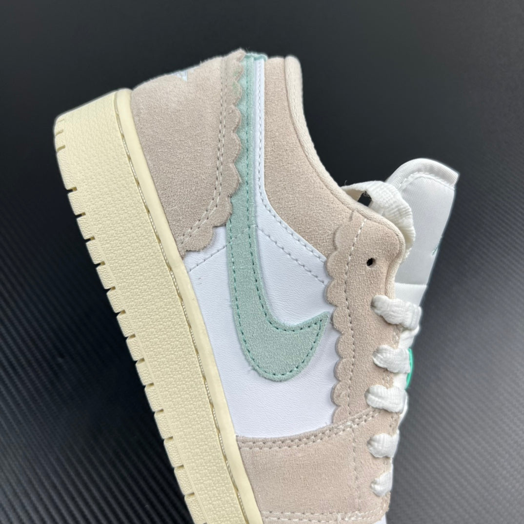 Air Jordan 1 Low front-side view, white panels with tan and mint accents.