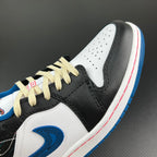 Low-top sneaker toe and laces detail in white, black, and blue with cream laces