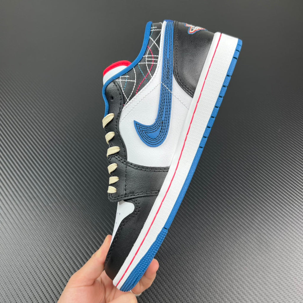 Low-top sneaker in white and black with blue accents, cream laces, and blue/red sole