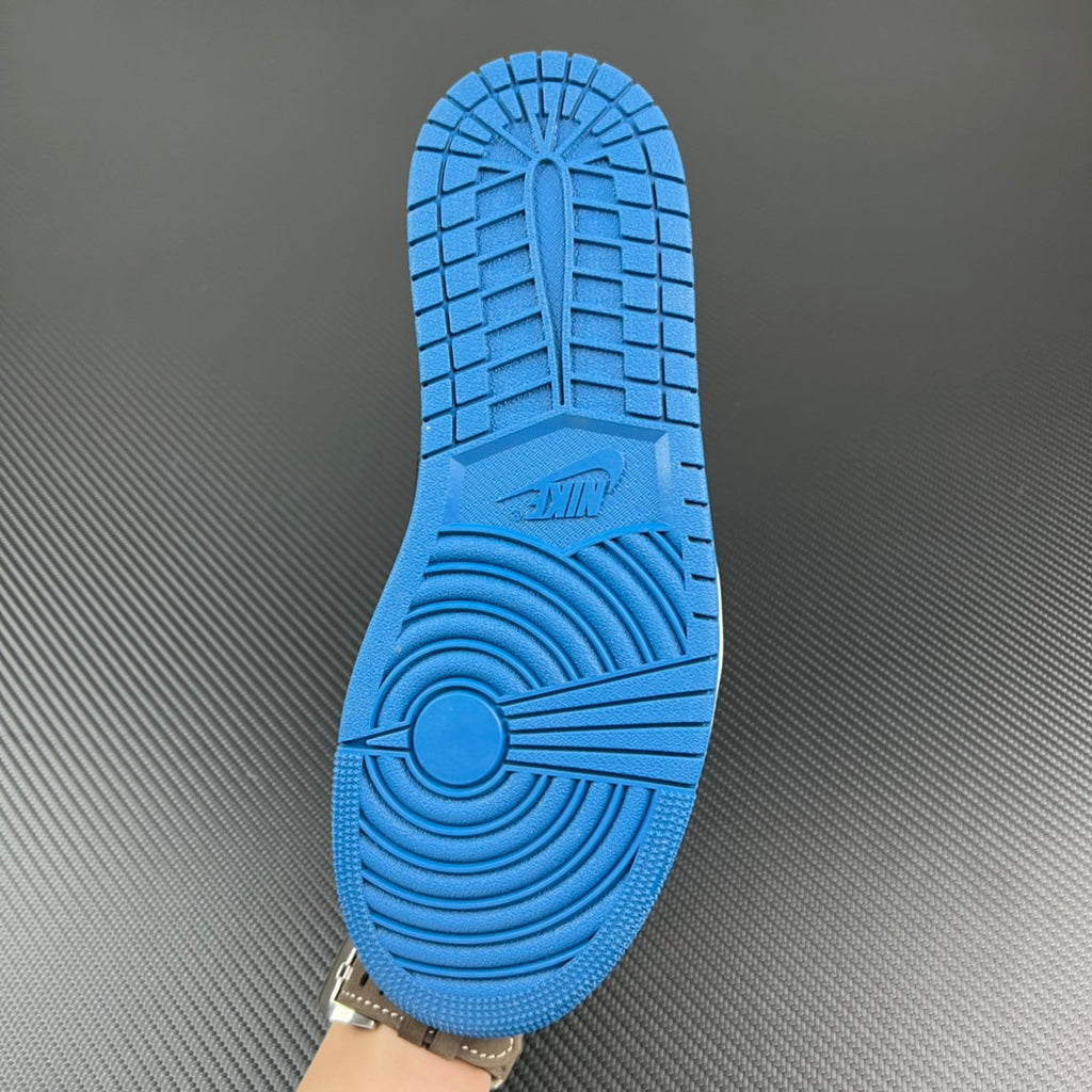 Blue rubber outsole with tread pattern and raised traction design