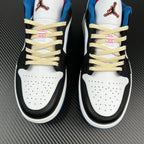 Low-top sneakers upper close-up with cream lace, red label, and perforated white toe