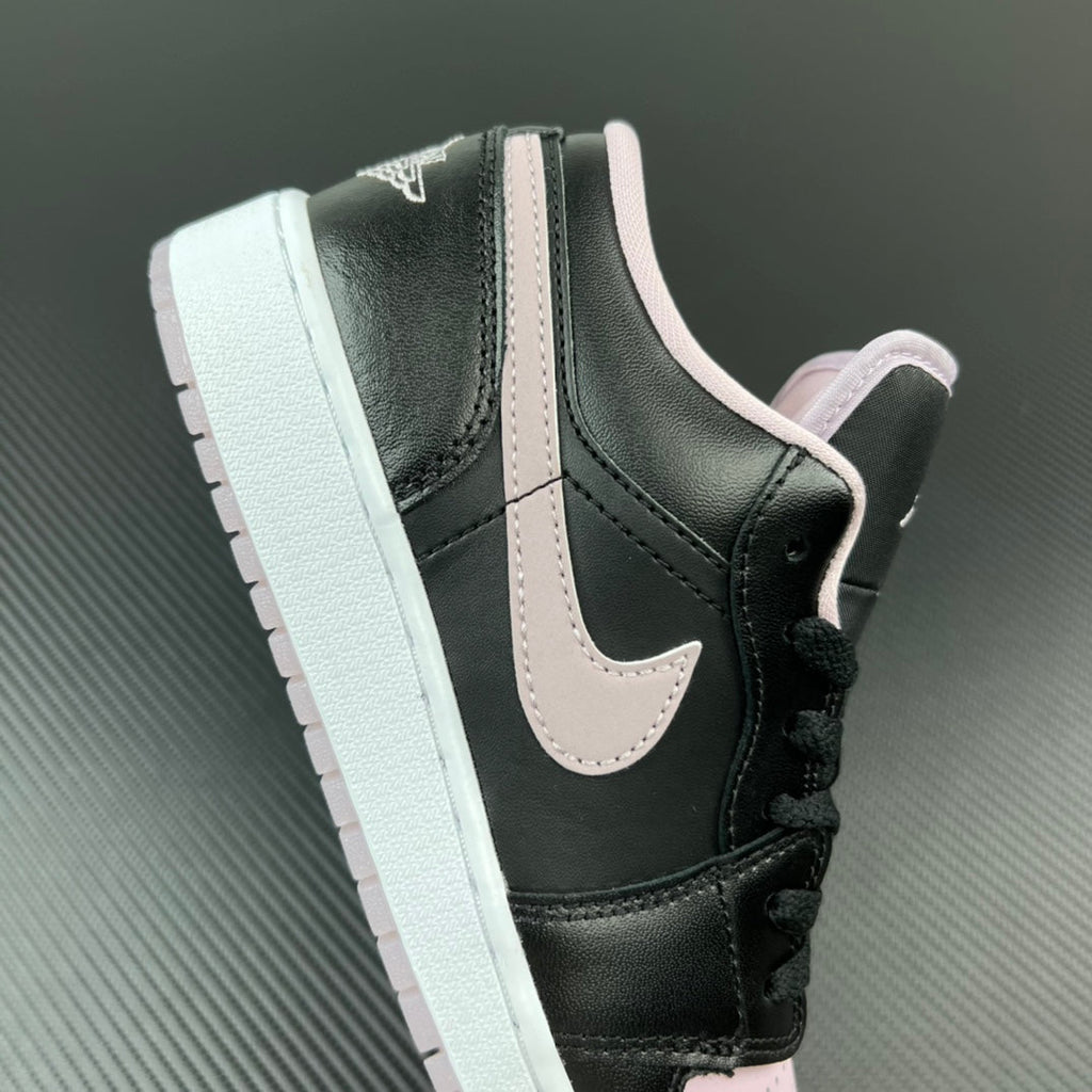 Air Jordan 1 Low sneakers, black leather with white swoosh and pink collar lining