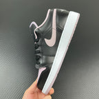 Air Jordan 1 Low sneakers, black leather with white midsole and pink accents