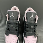 Air Jordan 1 Low sneakers pair, black laces with pink collar and white toe panels