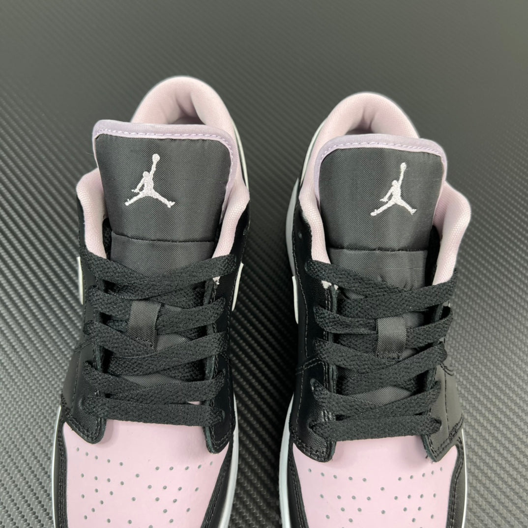 Air Jordan 1 Low sneakers pair, black laces with pink collar and white toe panels