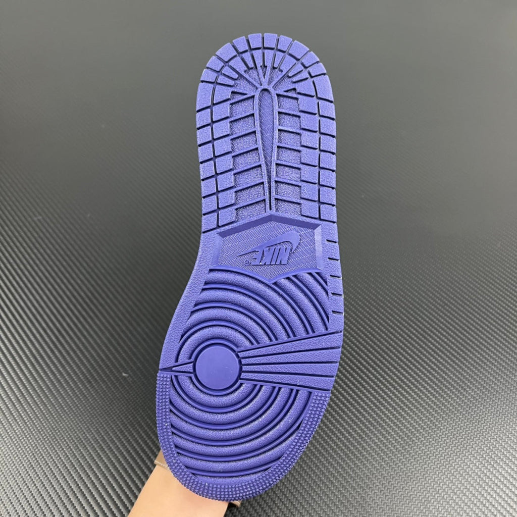Purple Air Jordan 1 Low rubber outsole with tread pattern and central circular logo