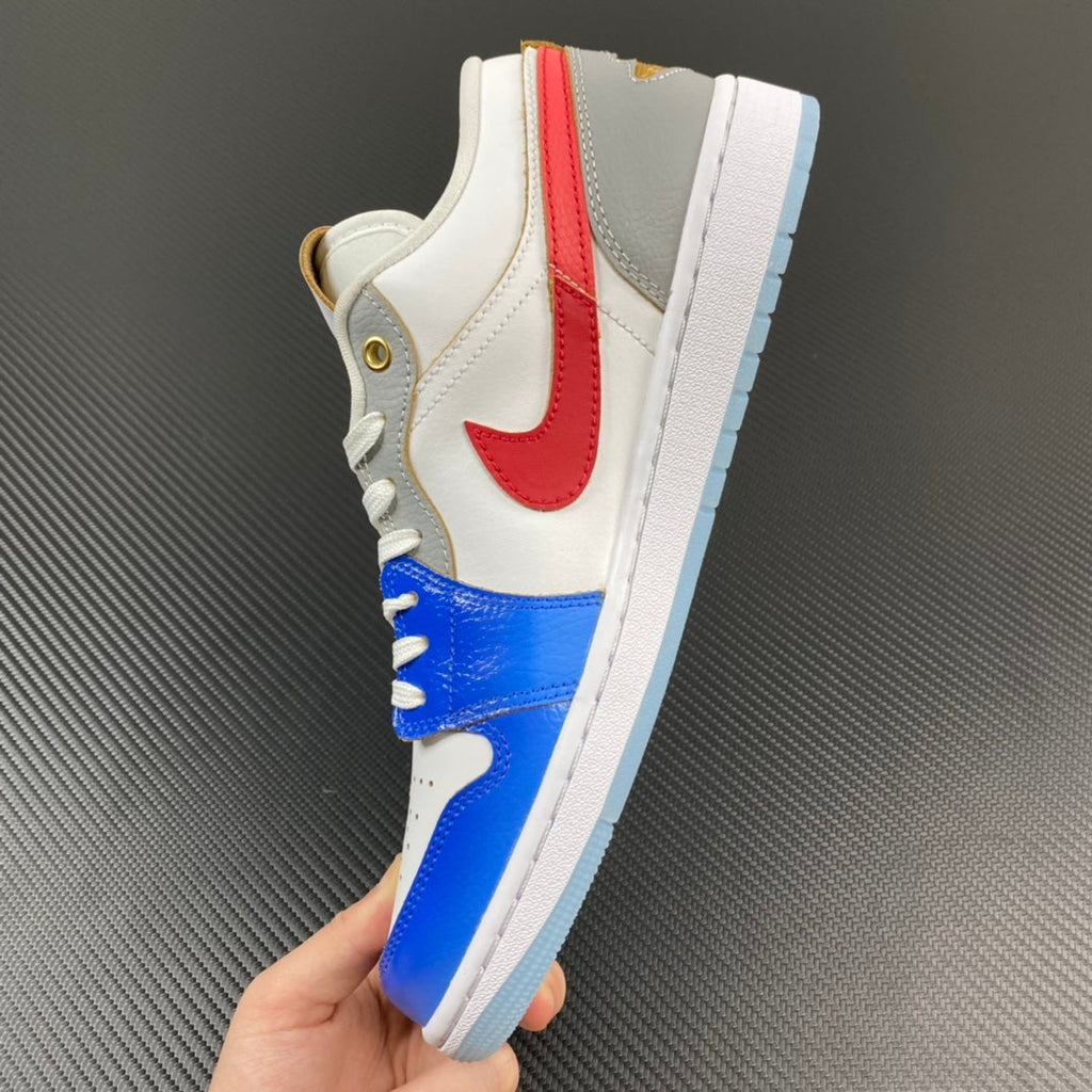 Air Jordan 1 Low sneakers with white upper, red stripe, blue toe and lace-up closure