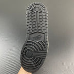 Black rubber outsole with traction grooves for Air Jordan low-top sneaker