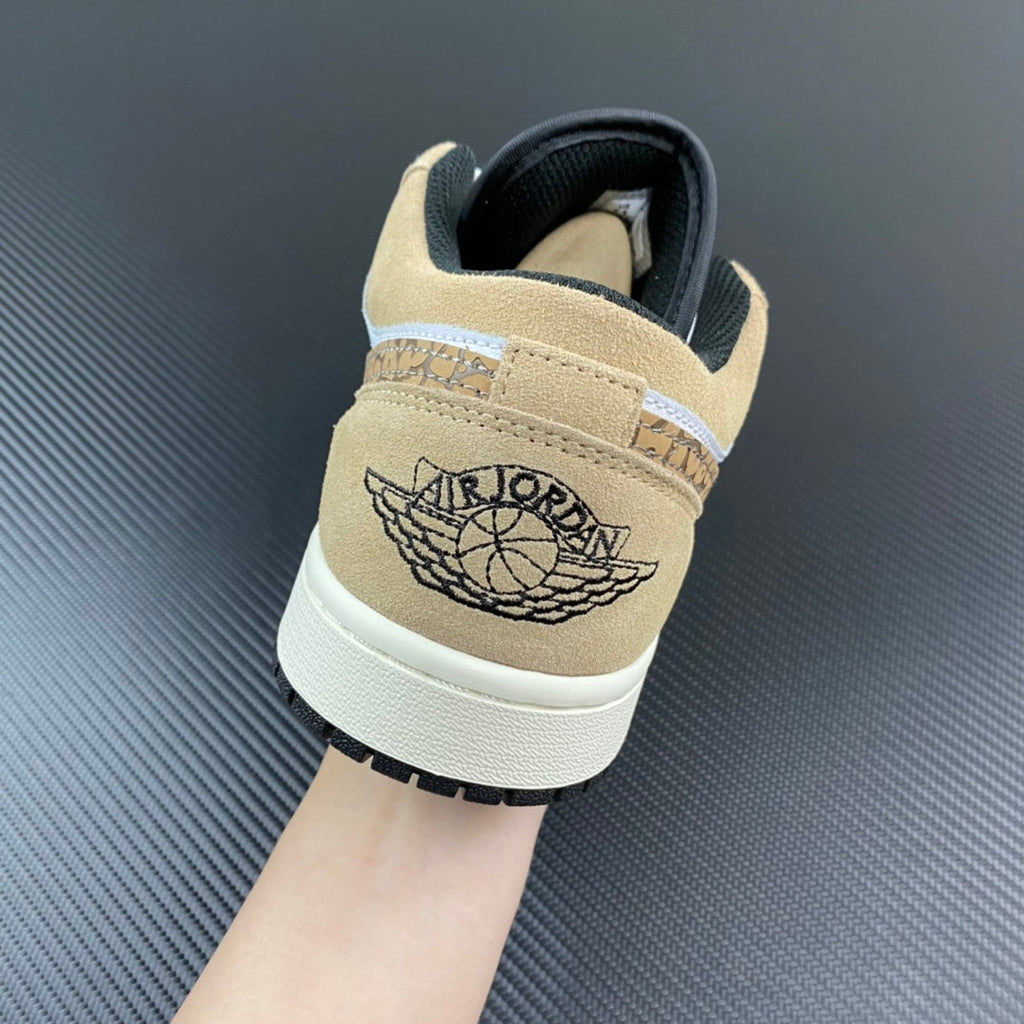 Tan and white low-top sneaker with AIR logo on heel and lace-up back