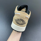 Tan and white low-top sneaker with AIR logo on heel and lace-up back
