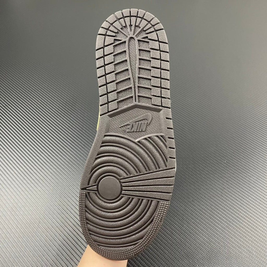 Shoe outsole with gray tread pattern and circular traction grooves