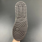 Shoe outsole with gray tread pattern and circular traction grooves