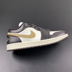 Low-top sneakers with white leather panels, dark brown overlays, and beige swoosh