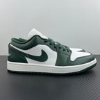 Low-top sneakers with white leather panels and dark green overlays, lace-up design
