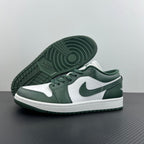 Low-top sneakers outsole view with dark green tread and white midsole