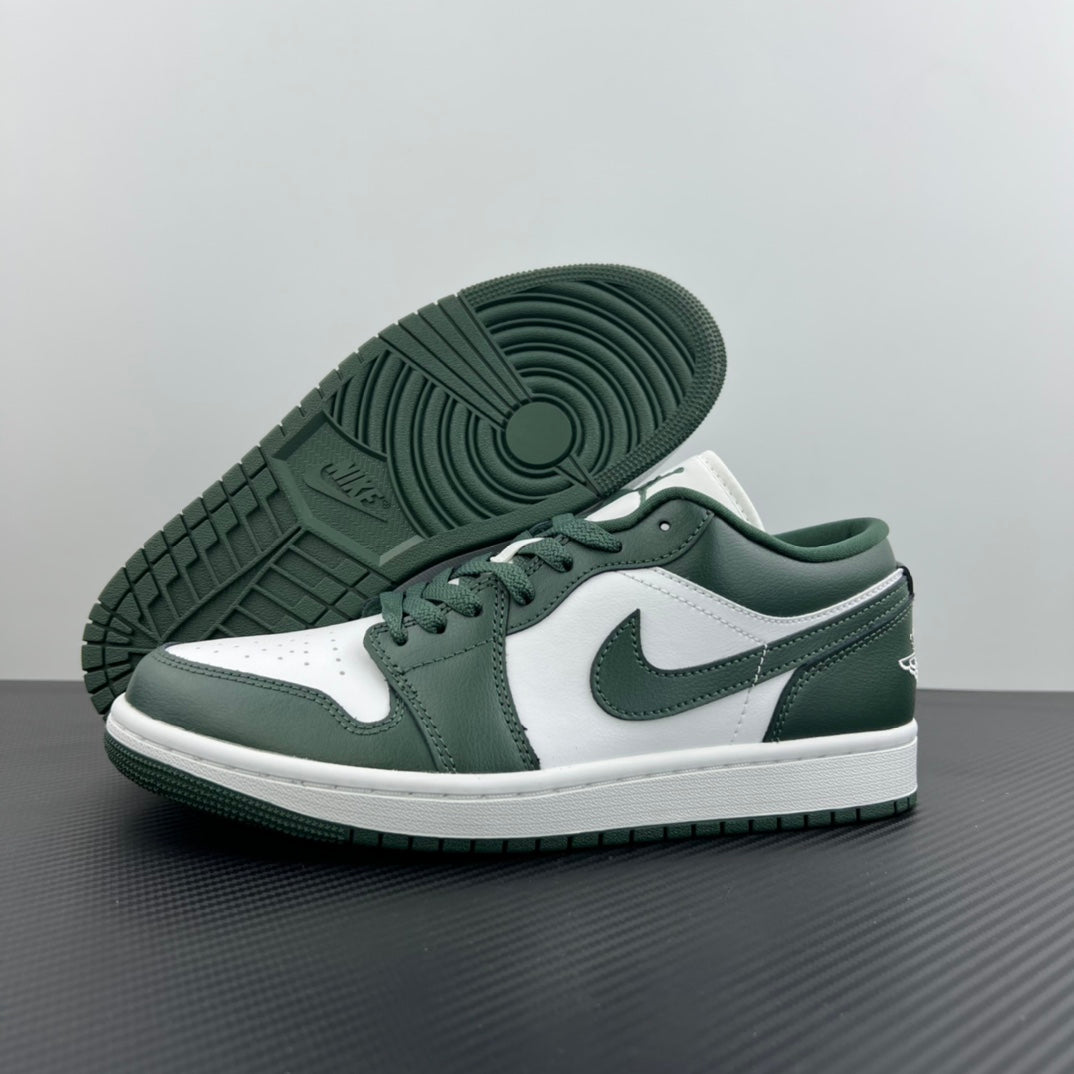 Low-top sneakers outsole view with dark green tread and white midsole