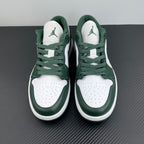 Low-top sneakers front view with white toe box, dark green laces and panels