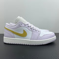 Women’s Air Jordan 1 Low sneakers in light lavender leather, yellow swoosh, white sole