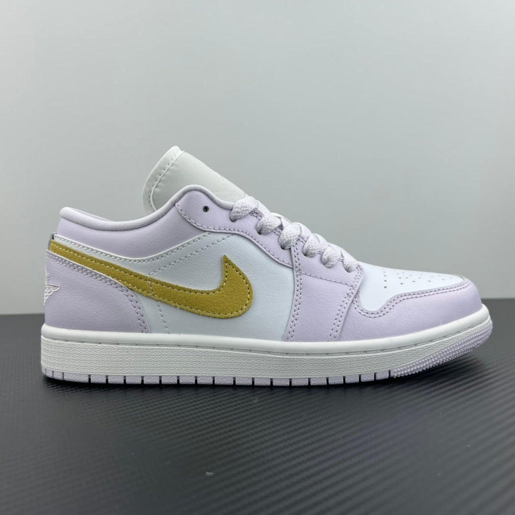 Women’s Air Jordan 1 Low sneakers, light lavender uppers with yellow Nike swoosh and white midsole