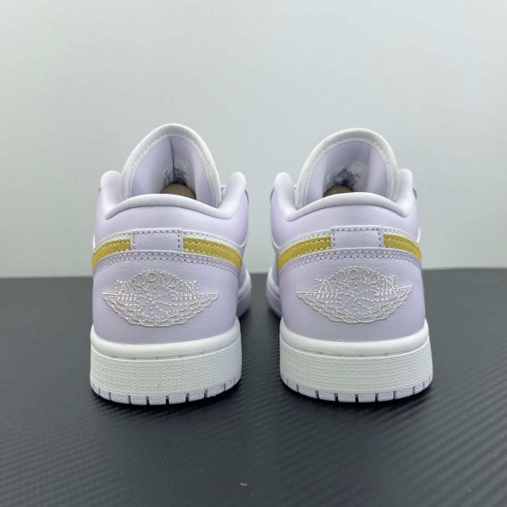 Women’s Air Jordan 1 Low sneakers heel view with Wings logo, light lavender and white