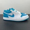 Low-top sneakers in white and aqua blue with Nike swoosh and lace-up design