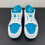 Low-top sneakers with Air Jordan heel branding, white laces and aqua blue panels