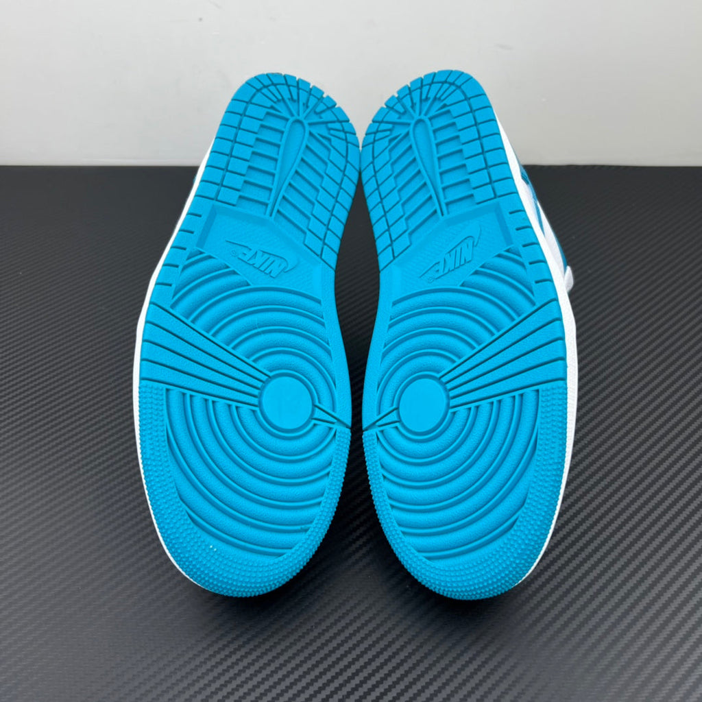 Low-top sneakers outsole bottom, aqua blue tread with circular traction patterns