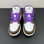 Pair of low-top sneakers with white toe box, brown sides, and purple laces