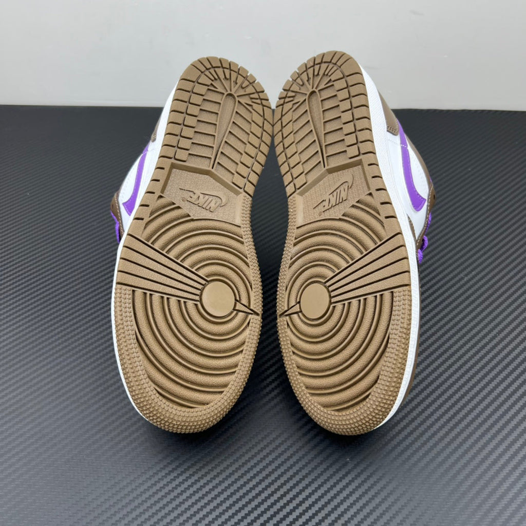 Low-top sneakers showing beige treaded outsoles and purple accents on sides