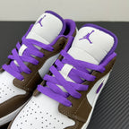 Low-top sneakers with brown quarters, white panels, and purple laces over tongue