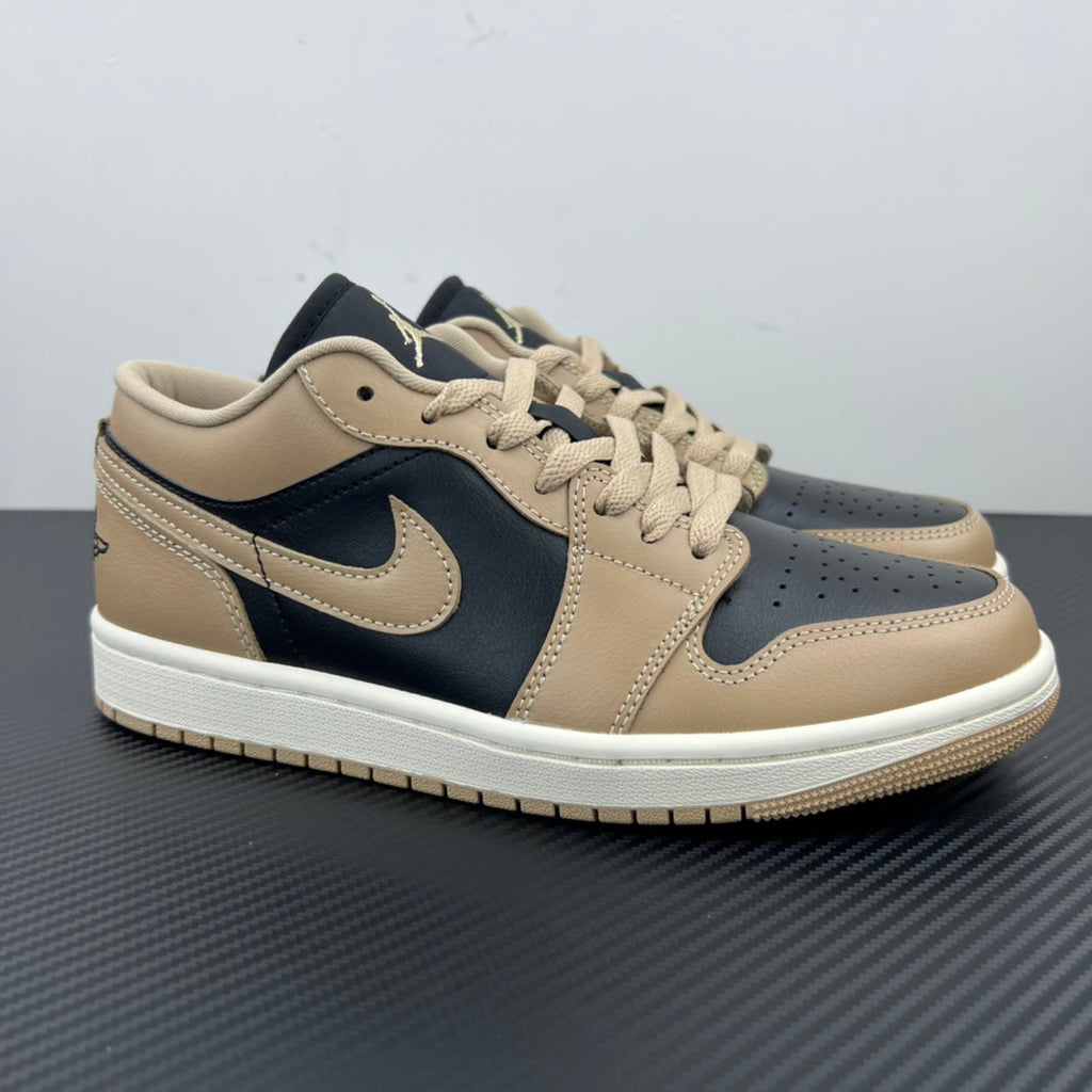 Low-top sneakers in tan and dark navy with Nike swoosh and lace-up.